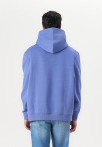 Tommy Jeans LINEAR LOGO HOODIE - Sweatshirt - soft sapphire