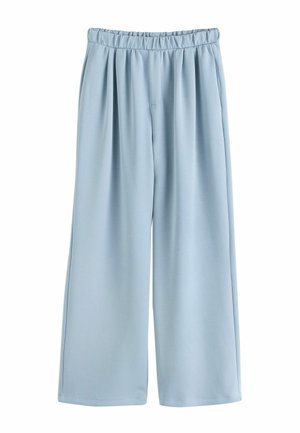 Jasnoniebieskie szerokie spodnie z elastycznym pasem i plisami z przodu, wykonane z gładkiej tkaniny.