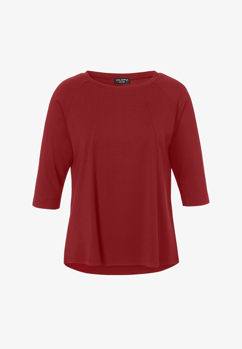 Rotes, weiches Stoffoberteil mit rundem Ausschnitt und dreiviertel Ärmeln. Verfügt über Raglan-Nähte und einen leicht abgerundeten Saum für eine entspannte Passform.
