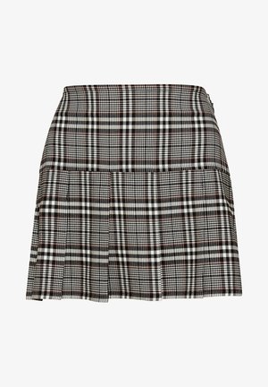 Sorte og hvide ternet nederdel med plissee-design, der har en tætsiddende talje og lynlås-lukning. Fremstillet af et struktureret stof.