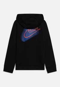 Black hoodie with a blue and red Nike logo across the back, featuring a smooth texture and kangaroo pocket. Adjustable hood included.
