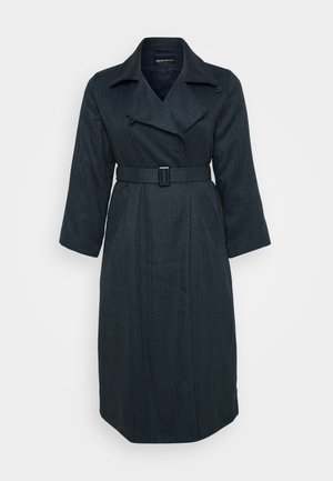 Dark gray trench coat made of textured fabric, featuring a notched collar, belted waist, and side pockets. Mid-length with wide sleeves.