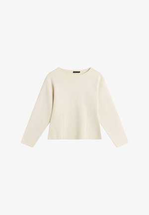 Pull à manches longues couleur crème avec un col rond et des détails discrets de coutures sur le devant, présenté sur un fond blanc.