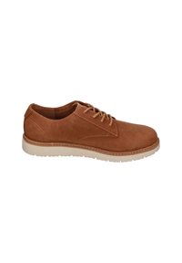 Chaussure en cuir brun à lacets avec un bout rond, des détails de couture minimaux et une épaisse semelle en caoutchouc blanc.