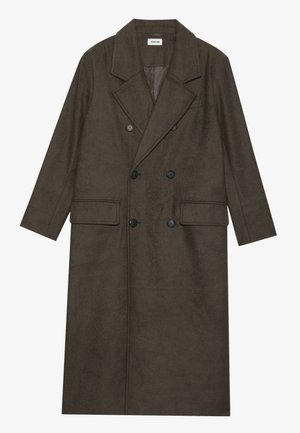 Double-breasted long coat in dark brown wool blend, featuring a notched collar, two front pockets, and black buttons. Smooth texture.