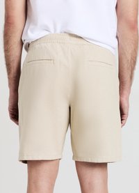 Calliope BIG JOGGER - Pantaloni sportivi - sabbia melange