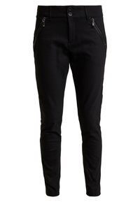 Pantalon noir fuselé en tissu doux et extensible. Doté de deux poches avant zippées et d'une fermeture à bouton à la taille.