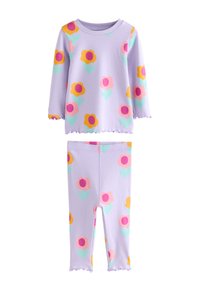 Lila langärmliges Oberteil und Hose mit bunten Blumenmustern in Gelb, Pink und Grün. Weicher, dehnbarer Stoff mit wellenförmigen Kanten.