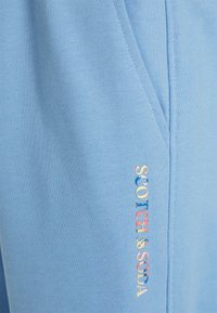 Scotch & Soda PANT UNISEX - Calças de fato de treino - blue