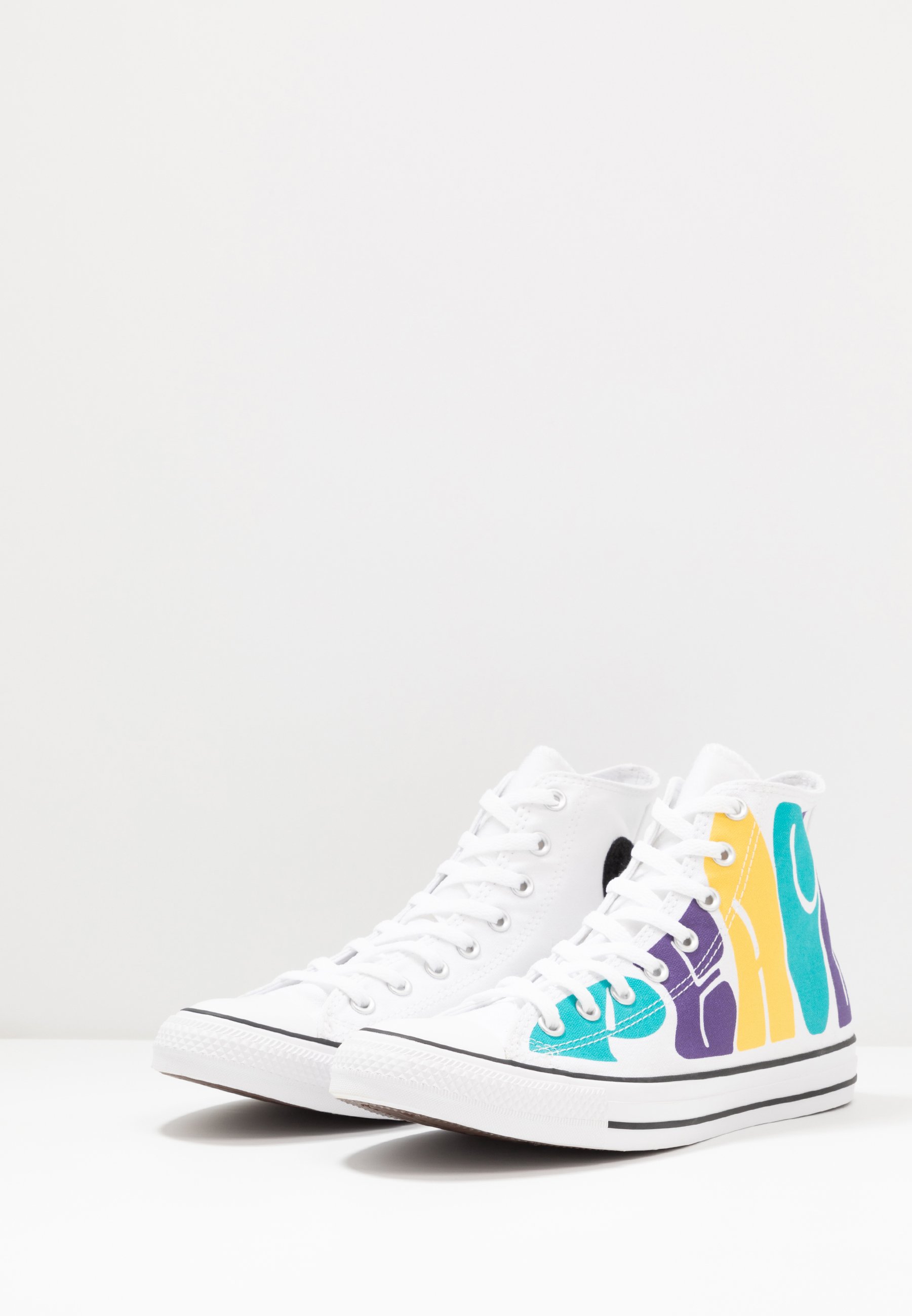 purple and yellow converse