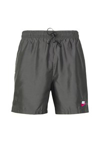 Miesten tummanharmaat uimashortsit, jotka on valmistettu kevyestä kankaasta. Niissä on joustava vyötärö, naru ja vaaleanpunainen Nike-logo vasemmassa alareunassa.