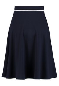 Navy blue flared skirt made of soft fabric, featuring a white accent line along the waistband. Smooth texture and knee-length design.