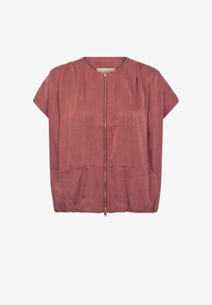 Jachetă roz prăfuit cu mâneci scurte, fermoar frontal, decolteu rotund, două buzunare și tiv ușor adunat, afișată pe un fundal alb.