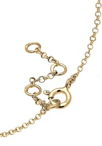 Guldtonad kedja med runda länkar, en lobsterlås och en justerbar förlängning med ytterligare cirkulära ringar.
