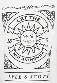 T-shirt blanc avec un imprimé noir représentant un graphique de soleil avec un visage, entouré du texte "LAISSEZ LE SOLEIL ENTRE" et d'éléments décoratifs.