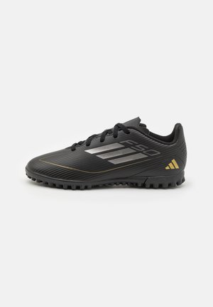 adidas Performance, F50 CLUB TF UNISEX - Chaussures de football sur gazon - core black/iron metallic/gold metallic