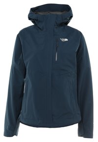 Veste imperméable bleu marine avec capuche, fermeture éclair avant, poche zippée sur la poitrine, poches latérales, et logo The North Face sur la poitrine.