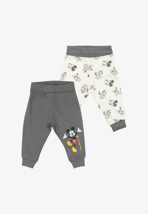 Due paia di pantaloni per bambini piccoli, uno grigio con Topolino colorato e testo, l’altro bianco con motivo di facce di Topolino in bianco e nero.