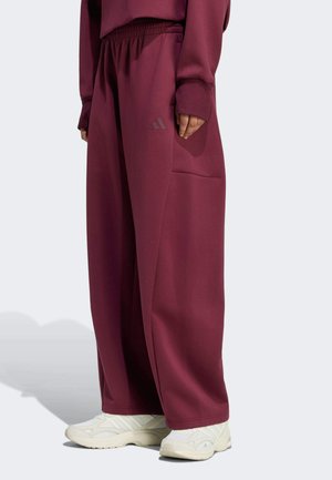 adidas Sportswear, ADIDAS SPORTSWEAR SOFT LUX WINTER KNIT BARREL PANTS - Pantaloni sportivi - maroon