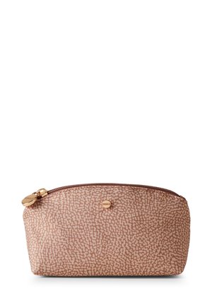 Zippered cosmetic pouch in textured pink fabric with a pattern of small, light-colored dots. Gold-tone hardware accents. Rounded shape.