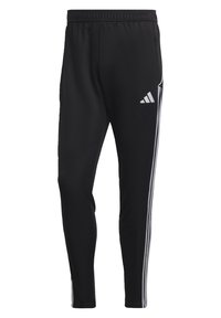 Black athletic pants with a tapered fit, elastic waistband, and three white stripes on each side. Features an Adidas logo in white.