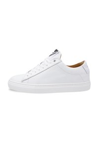 White leather sneakers with a textured finish, soft inner lining, round toe, lace-up design, and a contrasting logo on the tongue.