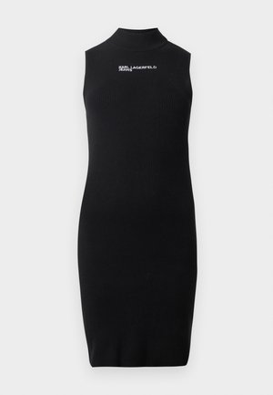 Robe noire sans manches en maille côtelée avec col montant et logo blanc "Karl Lagerfeld Jeans" sur la poitrine.