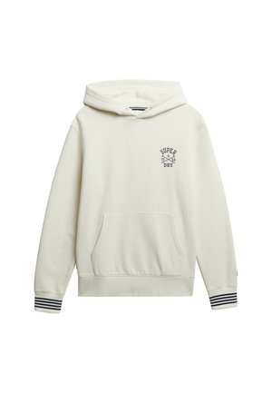 Cremfarbener Hoodie aus Baumwolle, mit einer Vordertasche, verstellbarem Kapuzenrand und marineblauen gestreiften Akzenten an den Bündchen. Logo auf der Brust gedruckt.