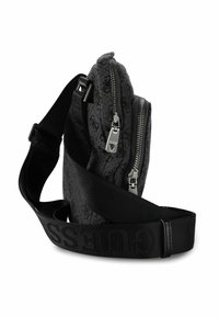 Borsa a tracolla nera con motivo a fantasia, dotata di più compartimenti con cerniera e una tracolla larga con marchio. Caratterizzata da tessuto strutturato e dettagli in metallo color argento.