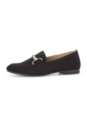 Black suede loafer with a pointed toe, featuring a decorative silver hardware accent. Flat sole, minimalistic design, smooth texture.