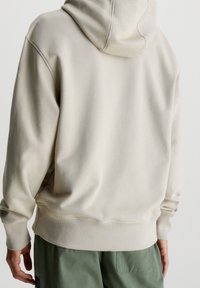 Calvin Klein Jeans Sweat à capuche - beige