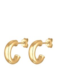 Orecchini a cerchio in oro con un design curvo e tubolare dalla texture liscia. Dotati di un supporto floreale per un fissaggio sicuro.