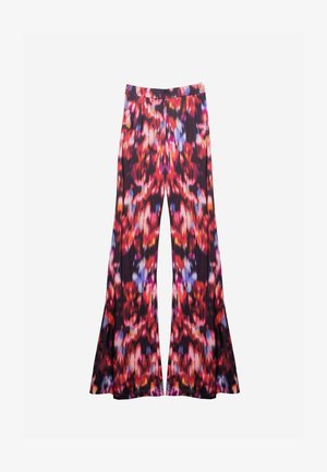 Pantalones acampanados con un vibrante patrón abstracto multicolor sobre un fondo oscuro, hechos de una tela suave y fluida.