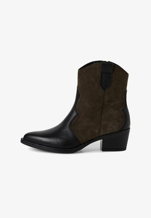 Black leather ankle boot with dark green suede panels, pointed toe, and a modest stacked heel; features decorative stitching and pull tab.