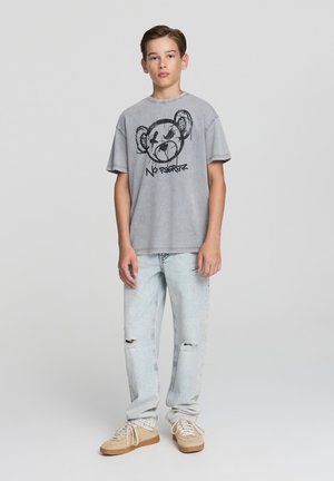 - T-shirt z nadrukiem