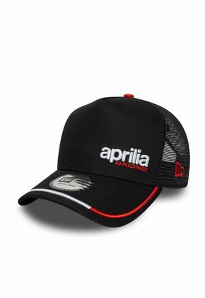 Black adjustable baseball cap with mesh back, "aprilia RACING" logo in white and red on front, red and white trim on brim, and red button on top.