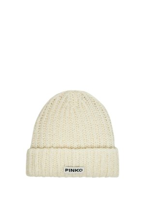 Berretto lavorato a maglia di colore avorio, con risvolto e una patch con logo. La texture è morbida e a costine, progettata per offrire calore e comfort.