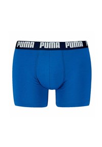 Boxer in blu con cintura nera e logo "PUMA" bianco. Realizzati in tessuto morbido con un design aderente e cuciture lisce.