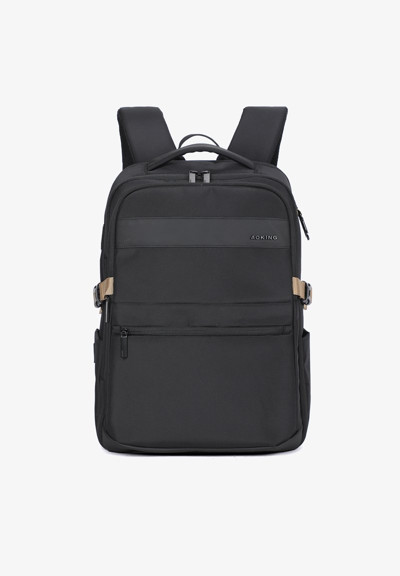 Zaino nero con spallacci imbottiti, molteplici scomparti con cerniera, tessuto testurizzato e accenti in hardware beige a contrasto.