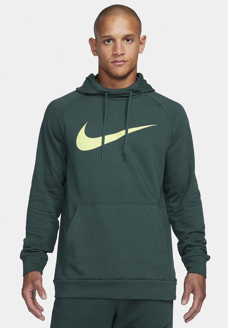 Dark green Nike hoodie with a spacious front pocket, raglan sleeves, adjustable drawstring hood, and a large yellow swoosh logo.