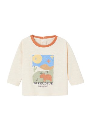 Cream long-sleeve toddler shirt with orange collar, featuring a colorful moose, mountains, sun, stars, and text "BAROUDEUR au grand coeur."
