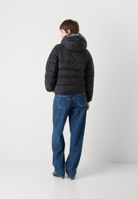 Calvin Klein Jeans LIGHTWEIGHT LOGO PUFFER - Vinterjakke - black