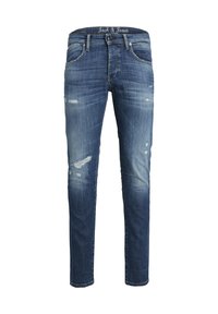 Los jeans de mezclilla azul oscuro presentan un corte ajustado con detalles desgastados, desvanecimiento visible y un diseño de cinco bolsillos. Nombre de la marca en la cinturilla.