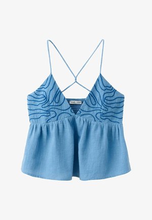 Haut bleu sans manches avec fines bretelles croisées, col en V, motif de lignes abstraites sur la partie supérieure et tissu ample froncé sous la poitrine.