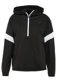 Czarna kurtka wiatrówka z kapturem, z półzamkiem z przodu, białymi akcentami na rękawach, elastycznym dołem i małym logo na piersi.