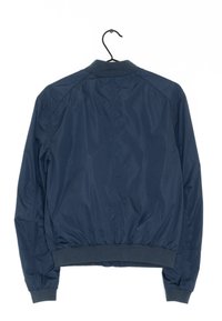 Navy blue bomber jacket, featuring a crew neck, elastic cuffs, and a slightly loose fit with a smooth, shiny texture. Rear view shown.