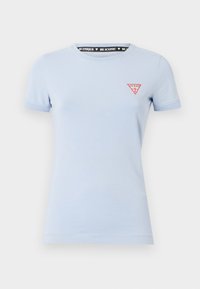 T-shirt azzurro chiaro realizzato in cotone morbido, con maniche corte e scollatura tonda. Include un piccolo logo a triangolo rosso sul petto.