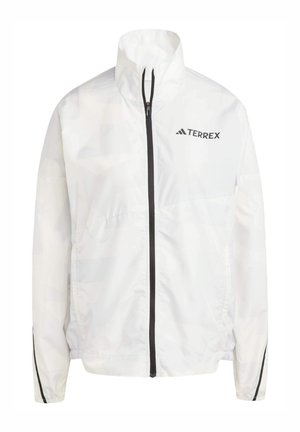 Witte lichtgewicht jas met hoge kraag, ritssluiting en zwarte accenten. Beschikt over een subtiel geometrisch patroon en het 'TERREX'-logo op de borst.