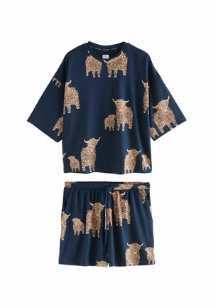Navy two-piece outfit featuring a loose-fitting short-sleeve top and elastic-waist shorts, both patterned with beige Highland cattle illustrations.
