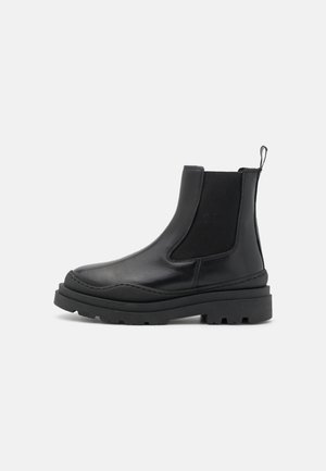 Bottines à plateau - black